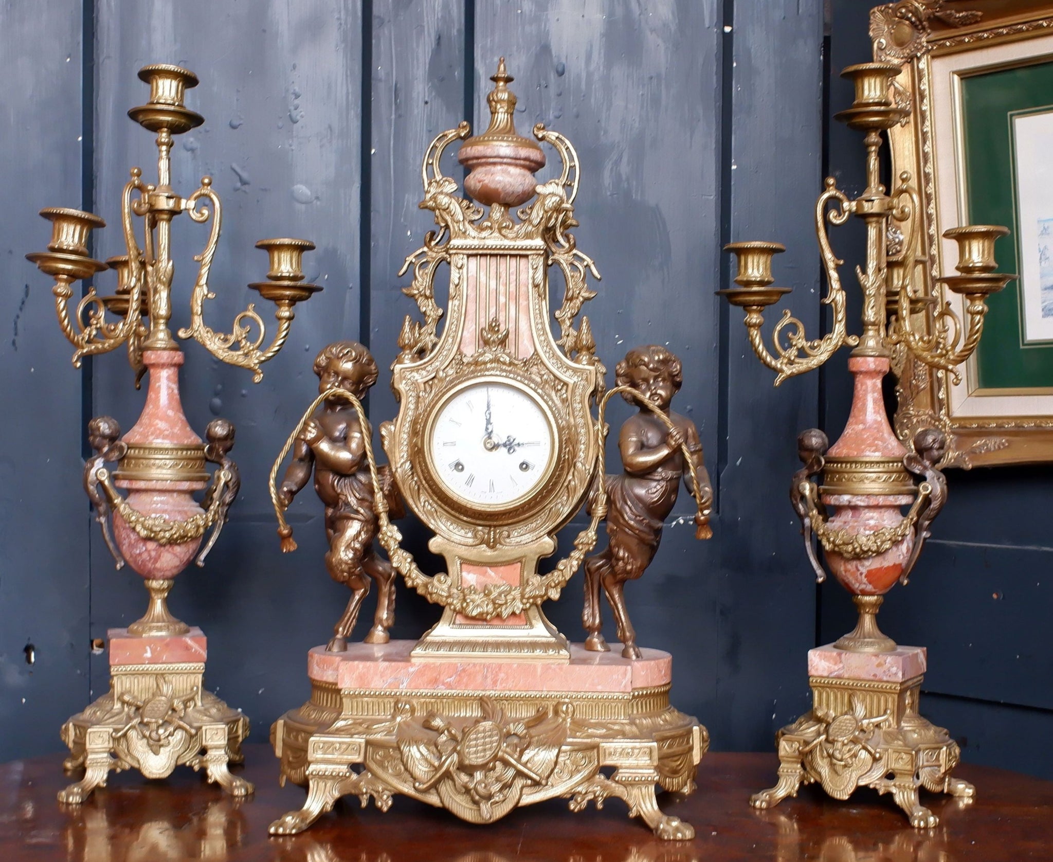 Antique brass gilded newest clock, cherub and griffen brass